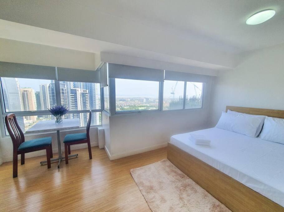 Bgc Taguig Cozy 2 Bedroom Loft, With Stunning Bgc Skyline View! مانيلا المظهر الخارجي الصورة